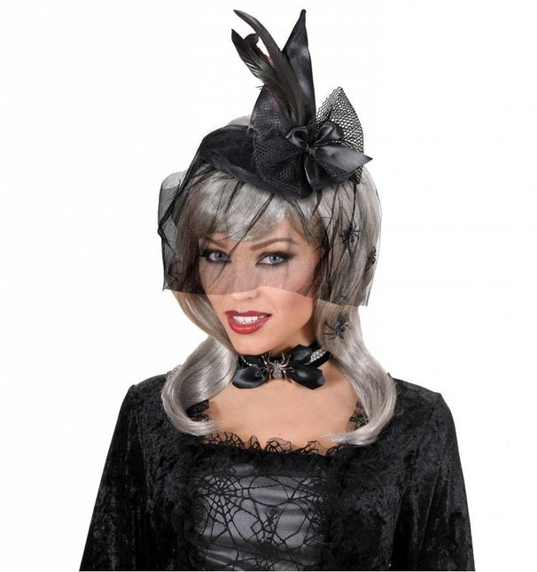 Halloweenaccessoires mini heksenhoed met veren en tule